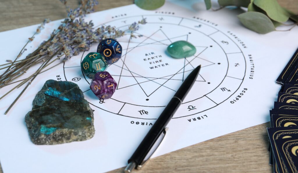 Astrololgy graph with pen and stones